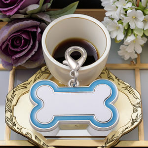 Pendentifs porte-clés en os de <span class=keywords><strong>chien</strong></span> personnalisables de haute qualité étiquettes de clé en métal créatives et sublimables vente en gros directe d'usine - Product Image 2