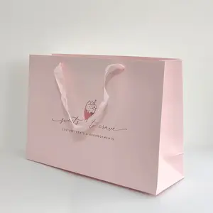 Luxury brand custom logo paperbag personalized bag clothes pink matte garment clothing boutique giftbag bags with logo print