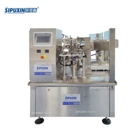 SPX Offre spéciale Deux buses Stand up sac liquide remplissage Machine à sceller huile jus lait Machine de remplissage noyau moteur composant