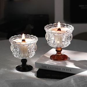 Elegant Glass <b>Candle</b> Holder with <b>Round</b> Design for Home Decoration Featuring Dripless Art <b>Candle</b> in Clear and Amber Base - Product Image 1