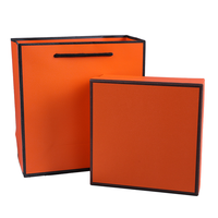 Boîte à serviettes en soie orange simple haut de gamme, emballage en carton, bord noir, couverture Ciel et Terre, 4C, vente en gros et au détail, fabriqué à partir de matériaux recyclés