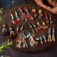 Boucles d'oreilles pendantes exotiques vintage faites à la main en coton avec pompon turquoise, personnalisées, avec perles de cuivre du Népal, cadeaux