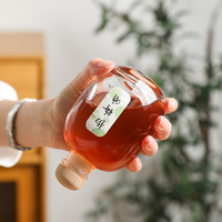 Vente en gros de bouteilles en verre rondes à petite ouverture, transparentes et givrées, de 100 ml, 250 ml, 375 ml et 500 ml, pour jus de fruits, vin, avec bouchon, logo personnalisé