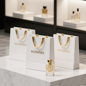 กระเป๋าช้อปปิ้งกระดาษตกแต่งโลโก้นูนพร้อมอุปกรณ์เสริมริบบิ้น - Product Image 3