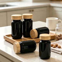 Vente en gros de flacons à pilules en verre noir, couvercle en bambou hermétique, pot à capsules en verre foncé pour compléments alimentaires, comprimés, impression personnalisée