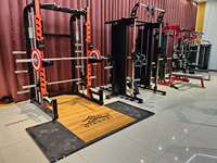Vente en gros à chaud en usine tout-en-un Peigne commercial Trainer Home Fitness Equipment Power Multi Functional Squat Rack Smith Machine