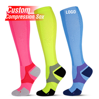 Vente en gros de chaussettes de sport pour la course à pied protège-jambes Chaussettes de pression pour la course à pied Chaussettes de compression en nylon