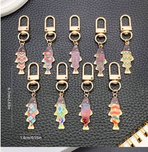 ของขวัญโปรโมชั่น พวงกุญแจ จี้ห้อยกระเป๋า สำหรับผู้หญิงและเด็กผู้หญิง ชุดลายสีฟ้า ธีมมหาสมุทร พวงกุญแจ ของขวัญวันเกิด ของใช้ในชีวิตประจำวัน - Product Image 2