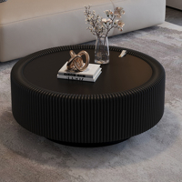 Table basse ronde moderne à cannelures avec plateau en verre trempé, corps en cuir PU, base en métal émaillé et rangement dissimulé