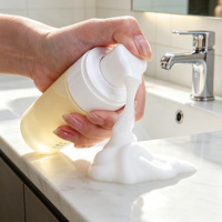 Bouteille en plastique écologique de 100 ml avec pompe en mousse plastique de haute qualité pour l'emballage de nettoyant visage