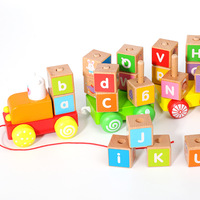 Vente en gros de blocs de puzzle créatifs, 26 lettres de l'alphabet, train en bois tourbillonnant, jouets éducatifs en bois pour la petite enfance, jouets pour bébés