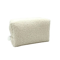 Sac de beauté en fausse fourrure tendance, pochette à maquillage portable personnalisée avec fermeture éclair, sac cosmétique en peluche avec poignée en cuir – Vente chaude