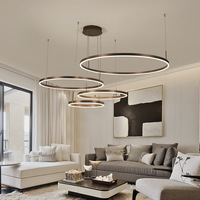 Luminaire suspendu LED rond minimaliste et créatif pour salon, salle à manger, hôtel, villa, lustre circulaire, luminaire de plafond