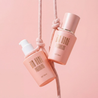 Flacon de sérum en verre rose givré personnalisé de 30 ml avec pompe pour l'emballage de crème de fond de teint liquide