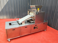 Biscuit rotatif à grande échelle en forme d'os pour chien faisant des biscuits Machine à craquer les noix Ligne de production de biscuits mous