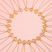 Collier léger de luxe à motif floral et lettre en forme de cœur pour femme, chaîne de clavicule unique et élégante