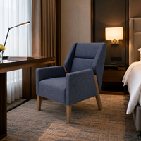 Fauteuil d'appoint unique en velours moelleux, tissu doux pour suite d'hôtel et chambre de lune de miel