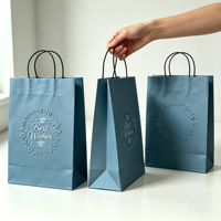 Sacs cadeaux en papier rose de luxe personnalisés avec logo imprimé sur mesure