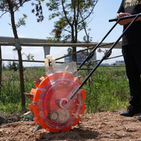 Semoir manuel à maïs haute efficacité, équipement agricole portable pour la plantation du maïs en ferme