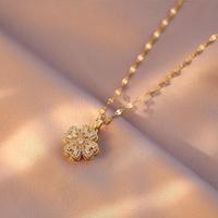 Collier tendance en acier inoxydable avec pendentif trèfle à quatre feuilles rotatif en pierre blanche, chaîne à maillons, pour femme, style brise froide, en cuivre de haute qualité