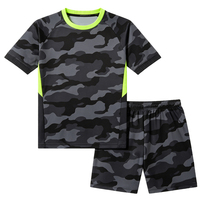 Ensemble maillot et short de football en tissu mesh 100% polyester OEM, design personnalisé unisexe, séchage rapide, manches courtes.
