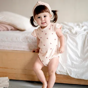 Taille personnalisée été enfant en bas âge bébé vêtements coton col rond couleur unie éponge imprimer sans manches bébé filles body barboteuse