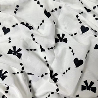 Tissu en coton brodé ajouré à motifs cœurs noirs et blancs, semi-transparent, pour robes, broderie personnalisée, fournisseur en gros