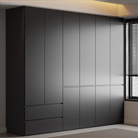 Armoire noire moderne sans poignées pour cuisine et chambre à coucher