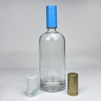 Bouteille en verre ovale transparente vide en gros, forme pilule, avec bouchon en liège en bois pour emballage cadeau de whisky et de liqueur
