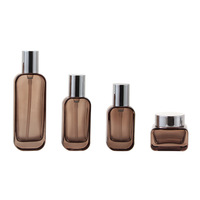 Ensemble de flacons cosmétiques en verre vides avec bouchon argenté, pompe à lotion rechargeable, format voyage, vente en gros, fournitures d'emballage personnalisées avec logo