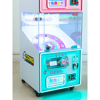 Machine de jeu de type grue d'arcade avec des prix en peluche et un système de fonctionnement à pièces - Construction durable pour une utilisation à long terme