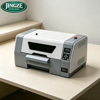 Machine d'impression UV haute vitesse à tête unique pour baskets, casquettes, chaussettes, accessoires de mode, impression de motifs personnalisés