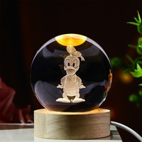 Vente en gros transfrontalière : Boule de cristal blanche lumineuse avec gravure intérieure 3D de dessin animé, veilleuse et ornement de bureau, cadeau créatif