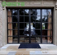 Porte battante en aluminium de style français à cadre lisse, offrant une esthétique minimaliste et un bon effet insonorisant