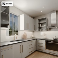 Meuble de cuisine en PVC avec portes thermoformées, aménagement moderne de luxe en L, boîtes en panneaux mélaminés et tiroirs à fermeture amortie