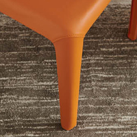 Vente directe d’usine design moderne et simple chaise à manger en cuir véritable de haute qualité éponge en forme spéciale chais