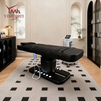Table de massage électrique de luxe en similicuir noir pour salon de beauté et SPA, idéale pour les esthéticiennes professionnelles