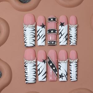 Pegatinas de uñas acrílicas hechas a mano de alta gama al por mayor, de longitud larga, cobertura completa, en blanco y negro, estilo Y2K, de alta calidad. - Product Image 1