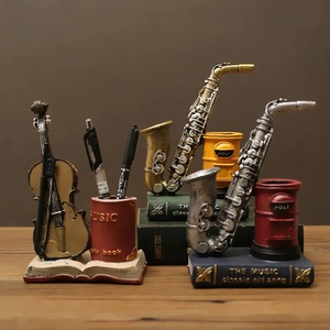 Contenitore di penne in resina Vintage personalizzato all'ingrosso Design unico da scrivania portamatite modello statuetta di violino sassofono stile carino - Product Image 1