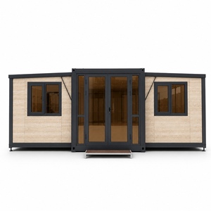 Casa Contenedor Expandible de Doble Ala en Venta, Hogar Modular Plegable con Habitaciones Laterales Simétricas y Entrada Central de Cristal - Product Image 1