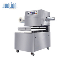 Machine d'emballage sous vide rotative continue Hualian HVT-450R pour aliments secs avec remplissage de gaz pour dattes et noix