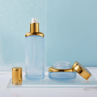 Ensemble cosmétique en verre personnalisé de luxe de haute qualité, pot de 30 g/50 g, flacon cylindrique de 40/100/120 ml, bouchon à vis sérigraphié pour les soins de la peau