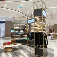 Kiosque à vêtements en acier inoxydable, présentoirs de vêtements personnalisés, présentoirs de boutique de robes pour femmes, meubles de vitrine