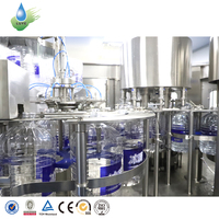 Machine automatique électrique de rinçage, remplissage et bouchage pour bouteilles PET de boissons (air et eau) 5L 10L, contrôle PLC, haute précision 1ml