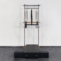 Tour de Pilates murale complète avec lit d'entraînement et accessoires pour studio de yoga