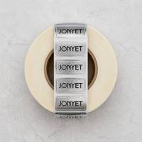 Étiquettes personnalisées en argent métallisé sur rouleau avec forme rectangulaire arrondie pour bouteille, bocal, boîte, cosmétique, bougie et emballage cadeau