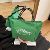 Nouveau Sac à langer élégant en nylon de style japonais, inspiré des influenceurs, ambiance dopamine, minimaliste, avec lettrage, grande capacité et fermeture magnétique, collection 2025