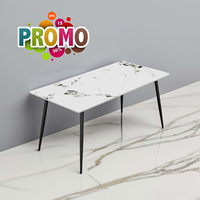 Table de cuisine minimaliste et moderne pour coin petit-déjeuner, salon ou salle à manger, avec base en acier et plateau en pierre frittée marbrée