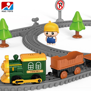 Treno Elettrico Fai-da-Te con 54 Pezzi in ABS, Segnali Stradali Simulati e Scena con Bambole, Gioco Puzzle - Product Image 4