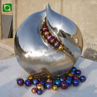 Sculpture abstraite d'art en métal de forme de pêche en acier inoxydable poli par miroir de décoration extérieure